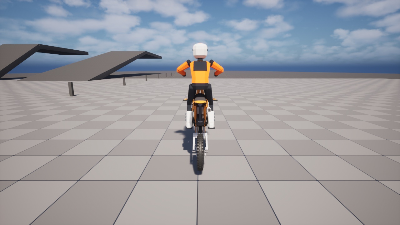 The orange enduro bike with a rider on the test pad